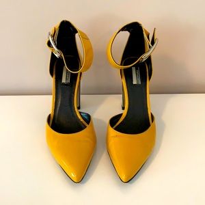 Yellow patent shoes